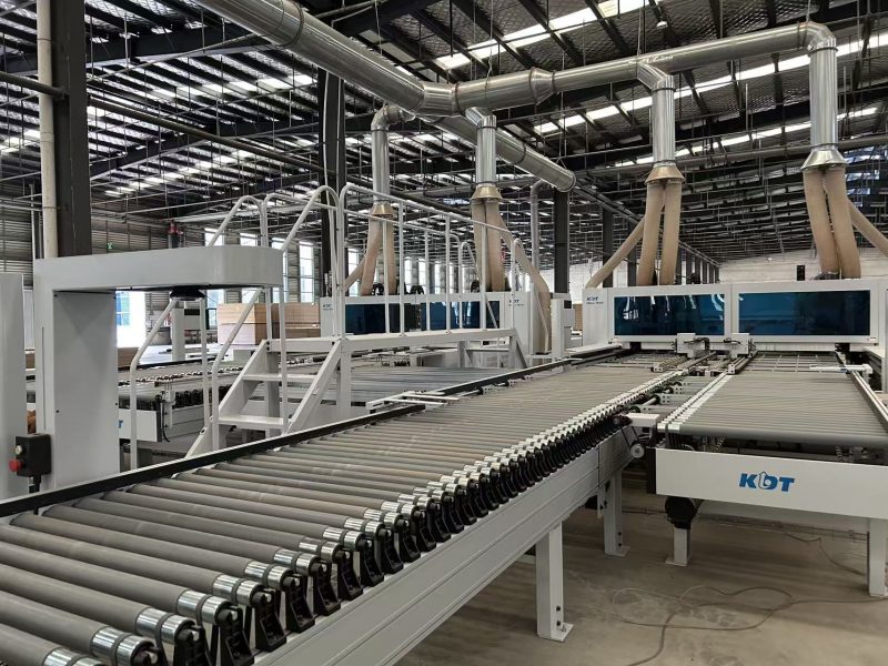 Dual-station six-sided CNC drilling machine